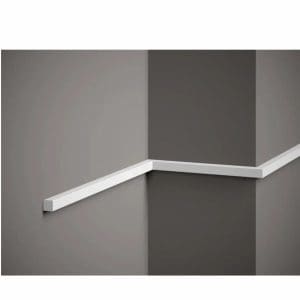 Moldura pared tipo taco fino MD010 instalada en panelado